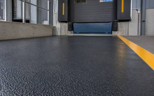 Textured non-slip coating at a loading dock door in Prince George, British Columbia